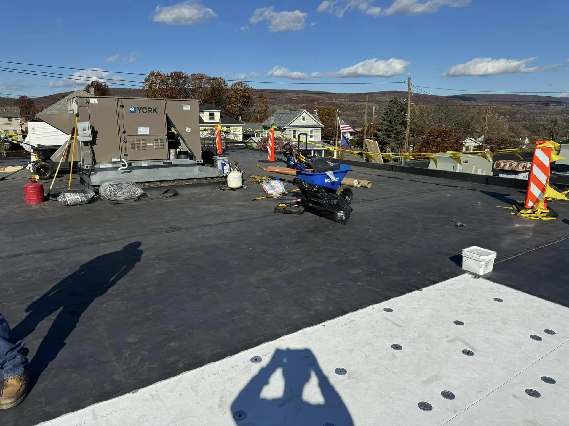 EPDM R-30 single ply commercial roof replacement project in Scranton, PA with rooftop HVAC units.