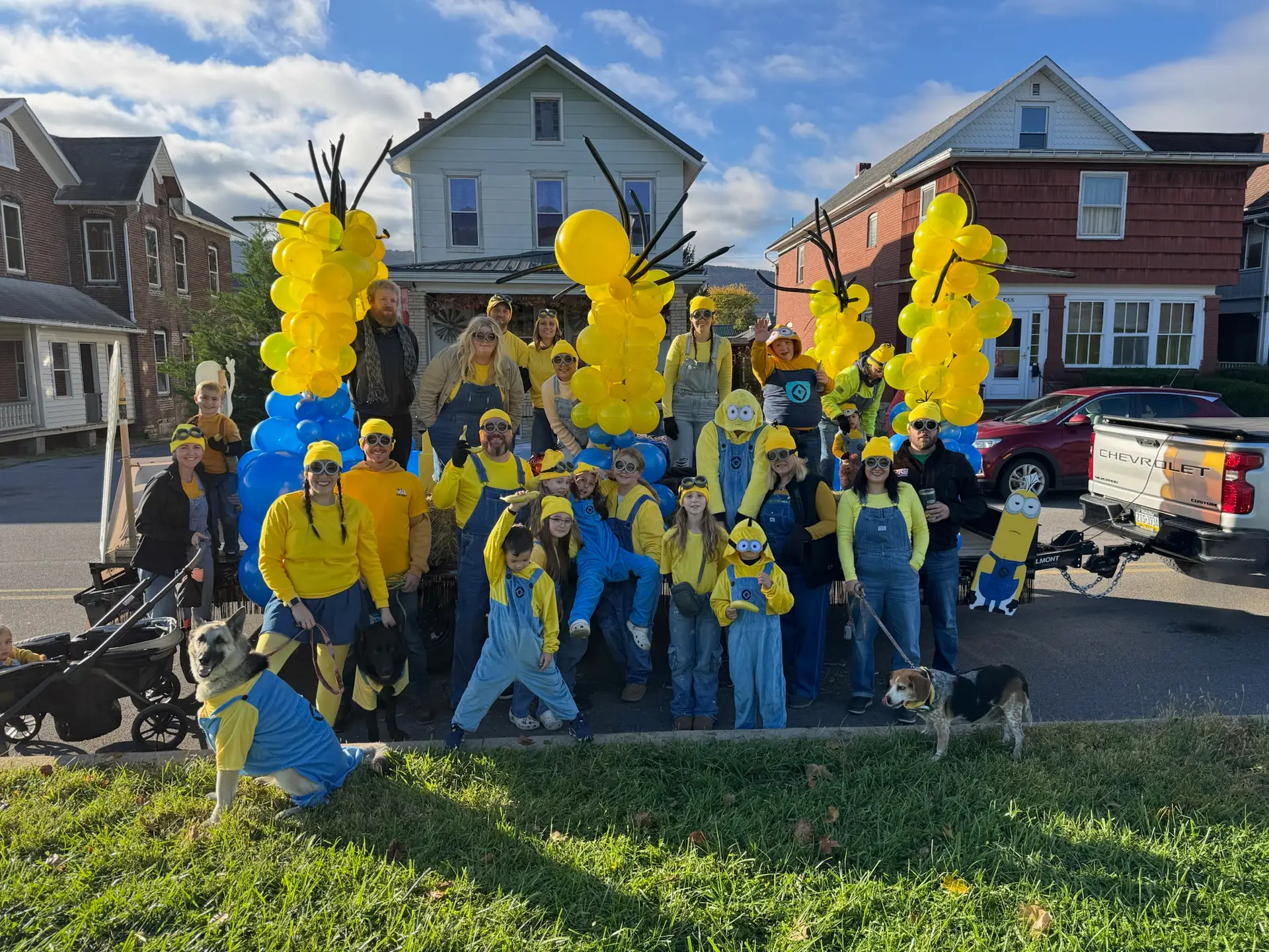 Hard Hats & Highlights | Commercial Roofing Contractors PA The RTG Solutions team posing with their Minions-themed float after winning Best Float at the Lock Haven Halloween Parade in Central Pennsylvania.