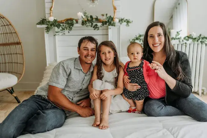 Hard Hats & Highlights | Commercial Roofing Contractors PA Robbie and Sarah Getz of RTG Solutions with their daughters Mallory and Leah at home in Lock Haven, Pennsylvania