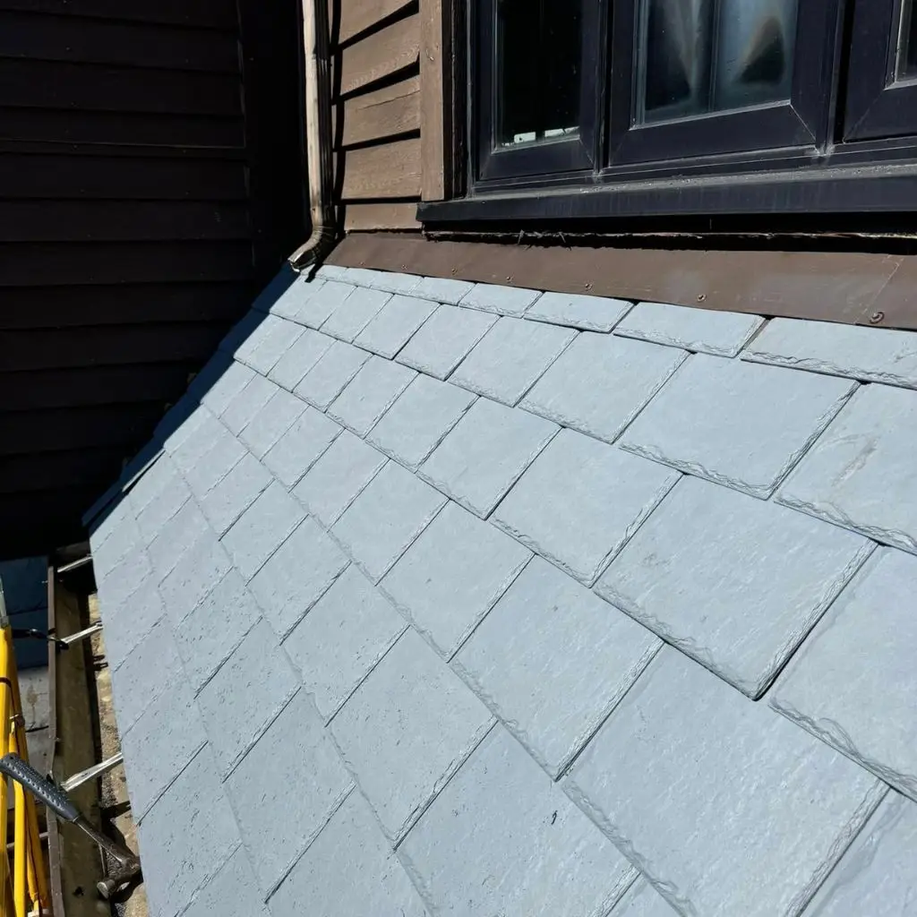 EcoStar synthetic slate reroof installation in Pennsylvania, providing a sustainable and durable alternative to natural slate for long-lasting commercial roofing performance.