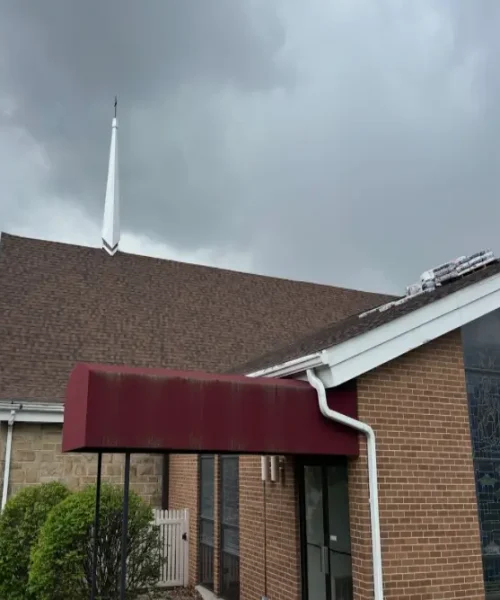 Steeple view of asphalt shingle replacement on Christ the King Church, Houtzdale, PA.
