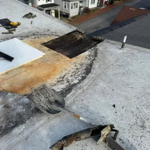 Commercial Roof Waterproofing – Standing Water Fix | Lock Haven PA RTG Solutions team repairing commercial roof waterproofing in Lock Haven, addressing standing water issues caused by elevated drain height.