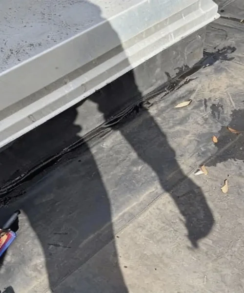 Single-ply roof repair detail at rooftop unit curb flashing on IHOP in State College, PA by RTG Solutions.