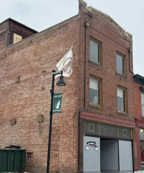 Historic Maxwell Building in Lock Haven, Pennsylvania, restored by RTG Solutions, showcasing expert masonry repair, new roof construction, and preservation craftsmanship.