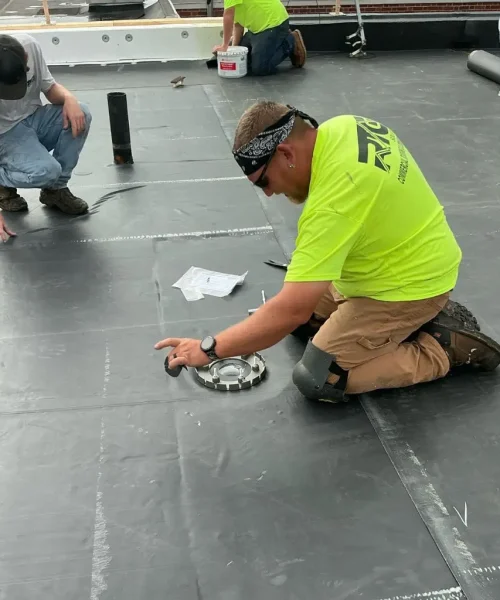 Commercial roof drain detail with membrane tie-in completed by RTG Solutions at Shippensburg University in Shippensburg, PA, supporting proper drainage and leak prevention on a government roof replacement project.