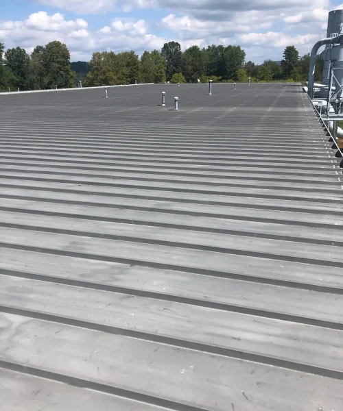 Commercial metal roofing project at USDA Woods Education Center in Central Pennsylvania, completed by RTG Solutions in October 2023. This was RTG Solution's first government and prevailing wage project.