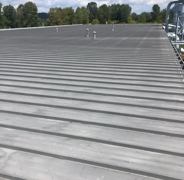 Commercial metal roofing project at USDA Woods Education Center in Central Pennsylvania, completed by RTG Solutions in October 2023. Commercial metal roofing project at USDA Woods Education Center in Central Pennsylvania, completed by RTG Solutions in October 2023. This was RTG Solution's first government and prevailing wage project.
